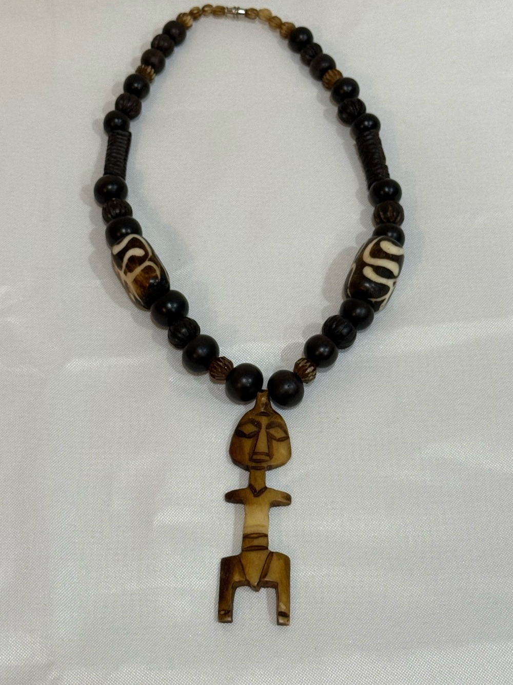 Handcrafted Brown Tribal Bead Necklace with Carved Pendant